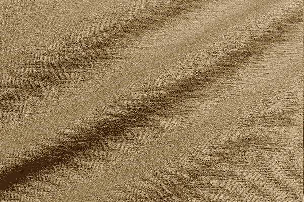 Close-up of light brown brushed fabric with a soft, slightly textured surface and subtle shading.