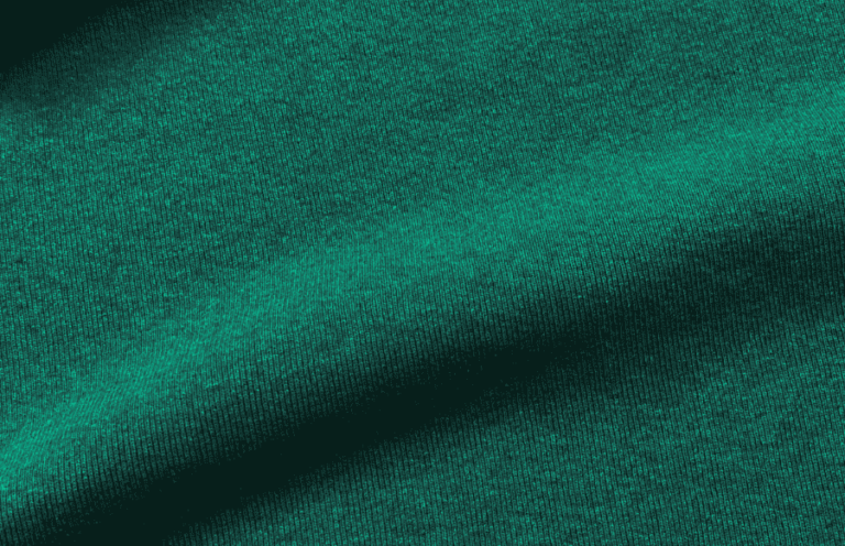 Emerald green brushed knit fabric with a soft surface.