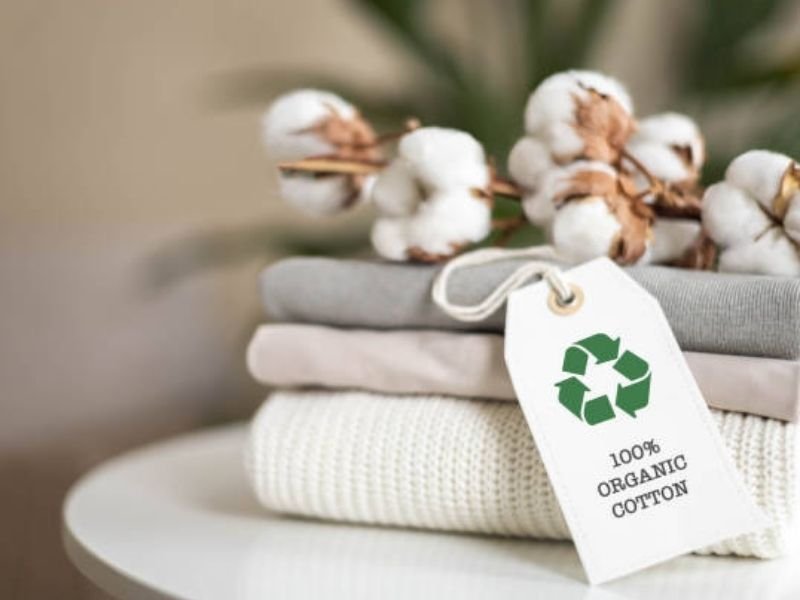 Organic cotton field vs recycled cotton bales